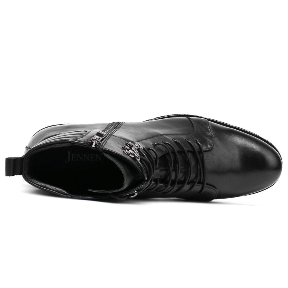 Black leather boot with a zipper on a white background