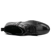 Black leather boot with a zipper on a white background