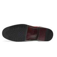 Close-up of a red shoe with black sole