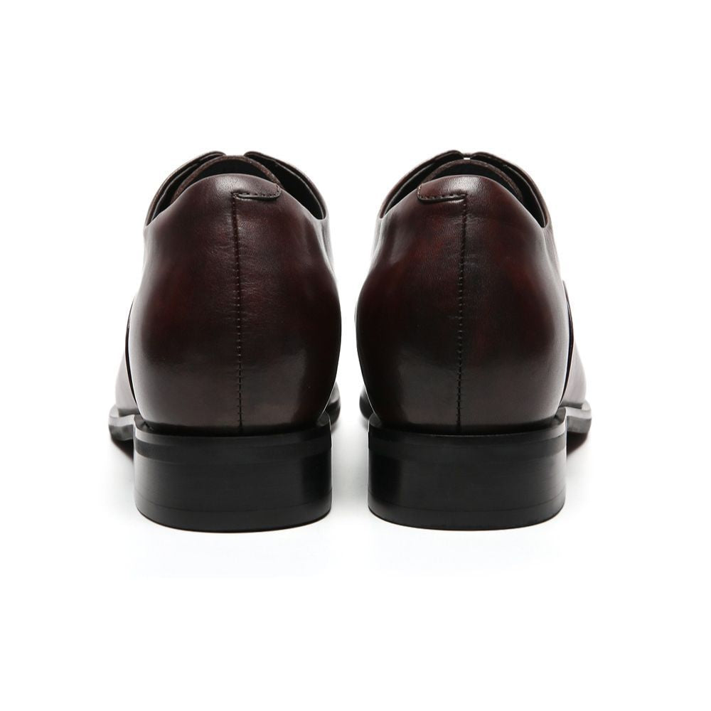 Pair of brown leather shoes  7cm taller
Back view