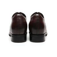 Pair of brown leather shoes  7cm taller
Back view