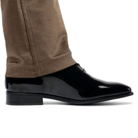 Black patent leather dress shoe worn with brown pants 7cm height boost