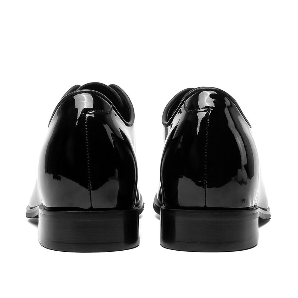 Pair of black patent leather shoes 7cm height back view