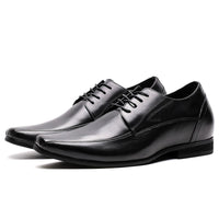 Pair of black leather classic elevator business formal footwear