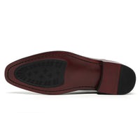 Close-up of a brown leather shoe sole with 7cm hidden heel