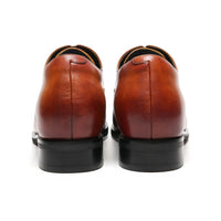 Pair of brown leather shoes with 7cm hight increase