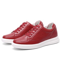 Bold red elevator sneakers with hidden insole lift and ankle support