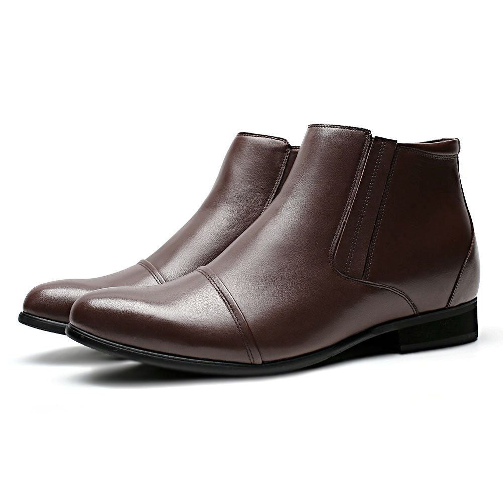 Brown elevator boots for men on wooden surface, emphasizing smooth polished leather and total 8 cm height increase