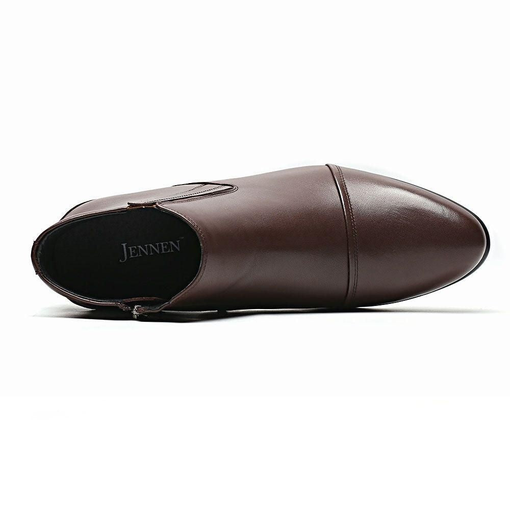 Brown elevator boots for men on wooden surface, emphasizing smooth polished leather and total 8 cm height increase