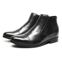 Pair of Mr. Ferras black leather elevator boots displaying formal style and hidden lift insole