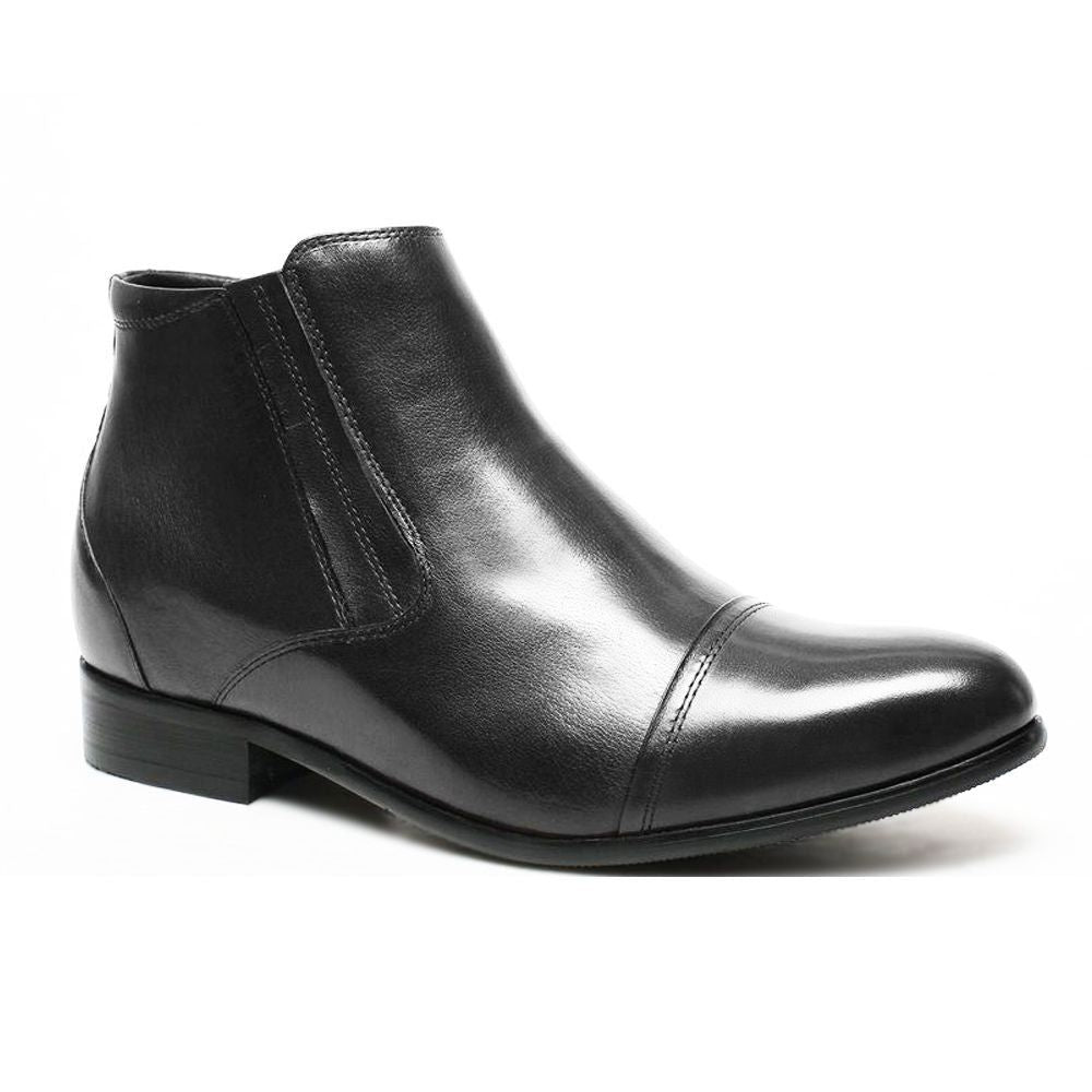 lose-up of Mr. Ferras boots highlighting leather quality, stitch details, and rubber outsole.