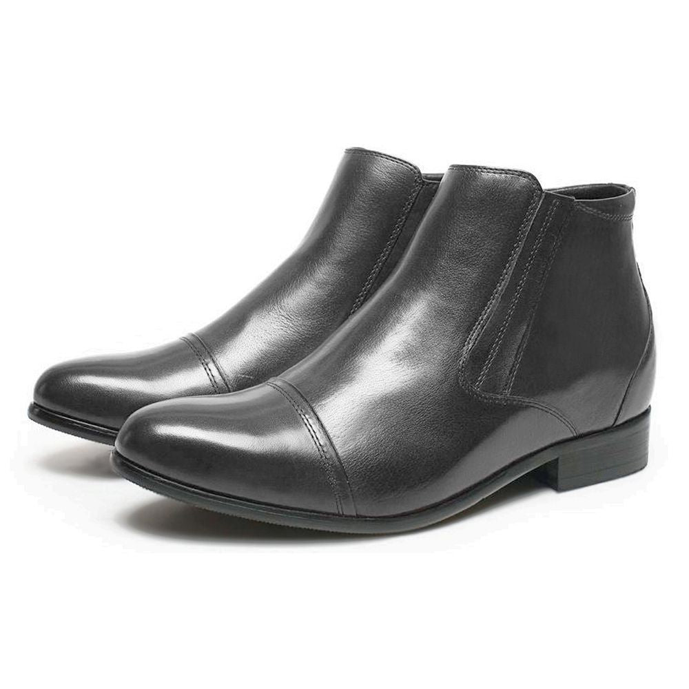 Close-up of Mr. Ferras black vegan boots showing zip-up closure and polished finish