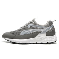 Close-up of Mr. Gunther grey sport shoes laces and pull tab at the back for easy slip-on fit.