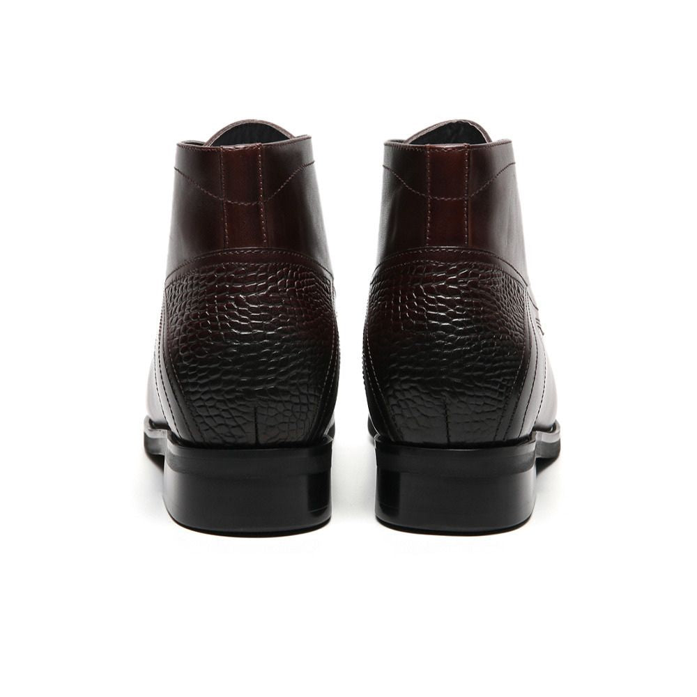 Back view of Mr. Hemingway brown leather chukka boots showing sleek heel and sturdy rubber outsole.