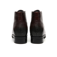 Back view of Mr. Hemingway brown leather chukka boots showing sleek heel and sturdy rubber outsole.