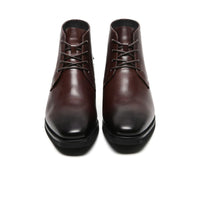 Hidden lift insole of Mr. Hemingway brown boots contributing to the total 7 cm height increase.