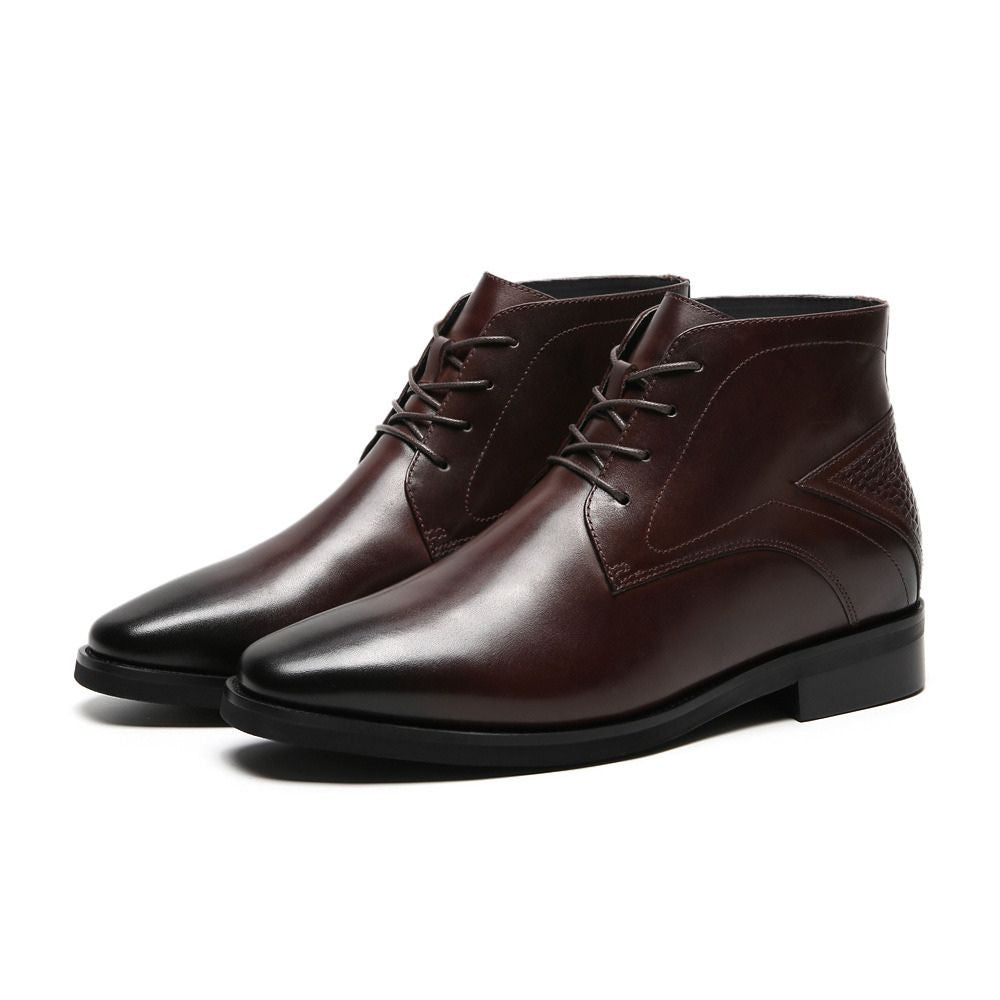 Pair of Mr. Hemingway brown leather elevator boots showing rugged design and hidden lift insole