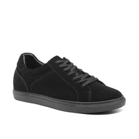 Close-up of Mr. Jackie sneakers highlighting suede quality, rubber outsole, and comfortable insole.