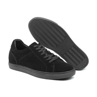 Close-up of Mr. Jackie black sneakers showing sturdy laces and suede texture