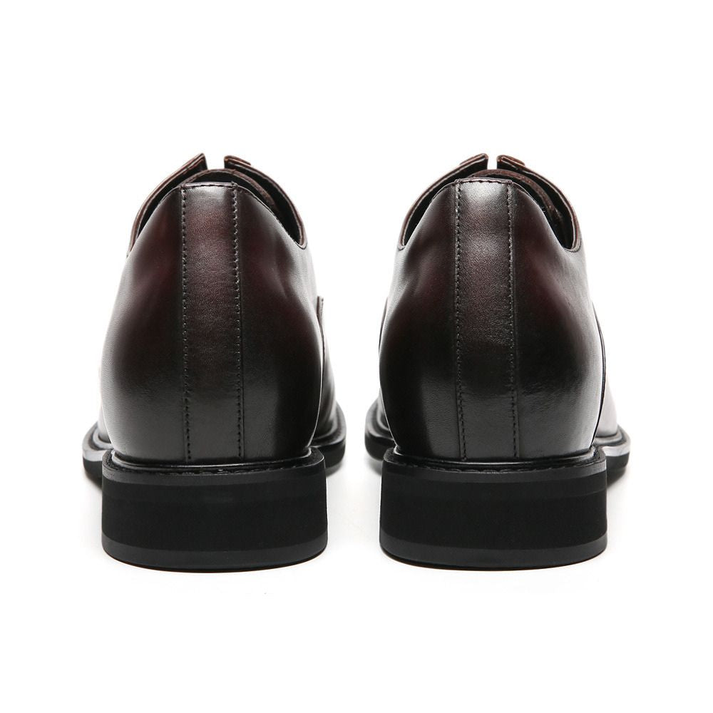 back view of brown elevator formal shoes