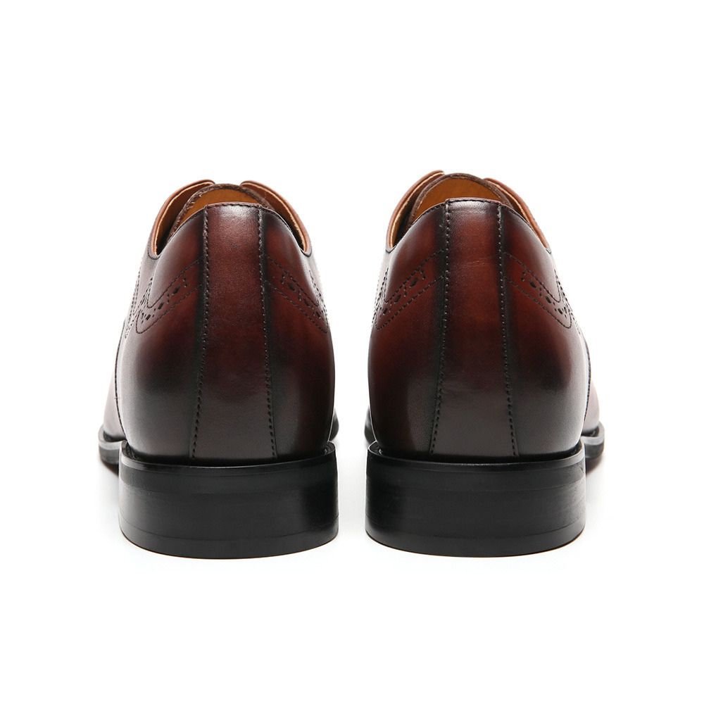 Back view of Mr. Mak men’s height-increasing formal shoes showing 2.5cm visible rubber heel and concealed 4.5cm lift insole for improved posture and confidence