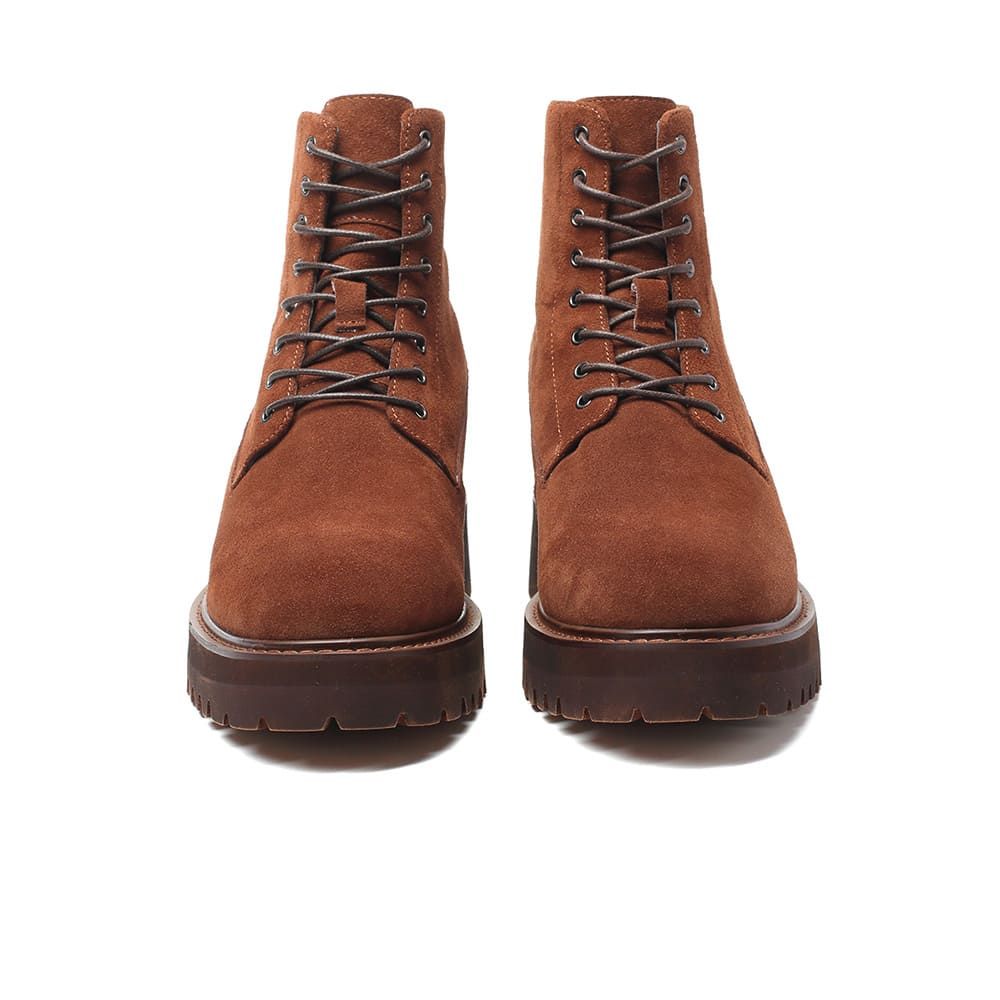 Hidden lift insole of Mr. Moses brown boots contributing to the total 11 cm height increase.