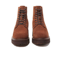 Hidden lift insole of Mr. Moses brown boots contributing to the total 11 cm height increase.