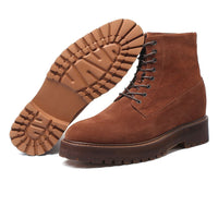 Pair of Mr. Moses brown suede elevator boots displaying 11 cm hidden lift and robust rubber outsole.