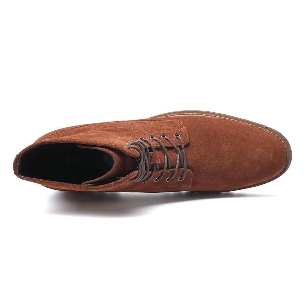 Angled view of Mr. Moses brown elevator boots showcasing slightly bulky design and elevated silhouette.