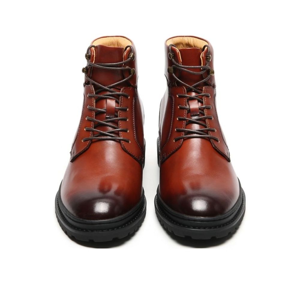 Brown leather boot with black sole