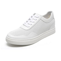 Close-up of Mr. Nadal sneakers showing smooth white premium leather, non-compressing polyurethane insole, and 6cm height boost for confident posture.