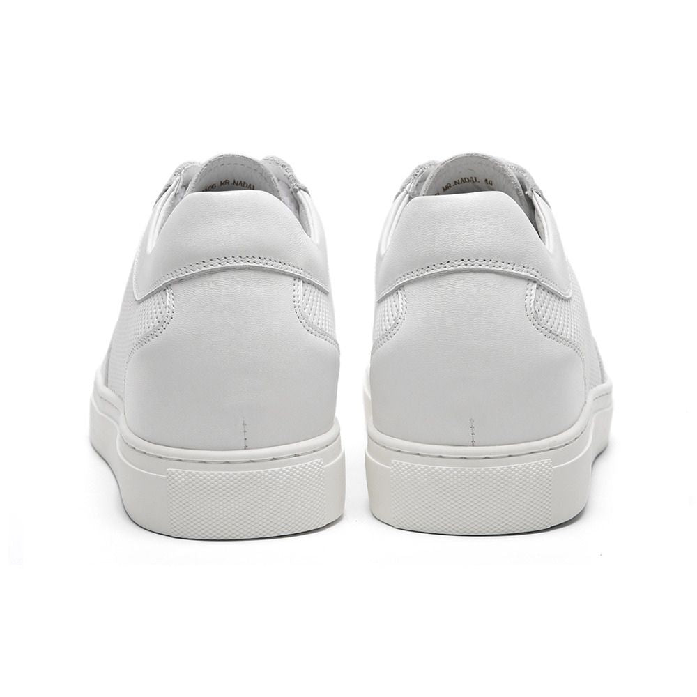 Interior view of white JENNEN Mr. Nadal sneakers showing cushioned insole, hidden lift, and premium leather lining for all-day support.