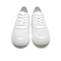 Lifestyle shot of Mr. Nadal sneakers worn with casual smart attire, adding 6cm discreet height for stylish men who value comfort and elegance