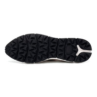 Close-up of Mr. Palma beige sneakers outsole showing durable premium rubber sole with 3cm visible lift, designed for grip and comfort by JENNEN Shoes.