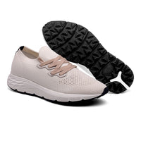 Beige fly knit elevator sneakers with hidden 4cm insole lift and 3cm outer sole boost for a total 7cm height increase.